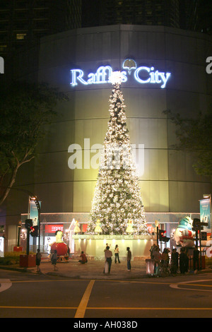 Christmas time at Raffles  City,Singapore ,illuminated Christmas tree in Singapore city Stock Photo