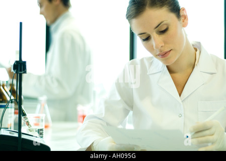Female scientist working in lab Stock Photo