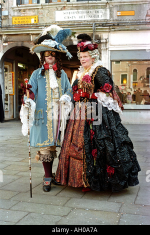 Person wearing costume and mask at Venice carnival Italy Europe Stock Photo