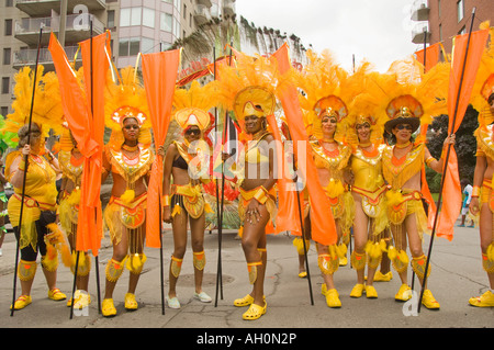 Canada Montreal Colorful costume paraders marching in the annual Caribbean festival downtown Stock Photo