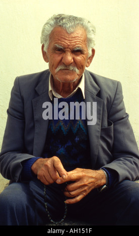 Cyprus Old Man with his worry beads komboloi Paphos Old Town Stock Photo