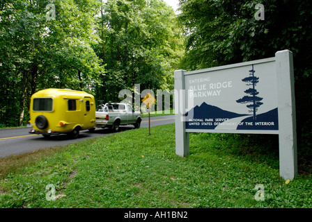 Family with camper trailer entering Blue Ridge Parkway, North Carolina Stock Photo