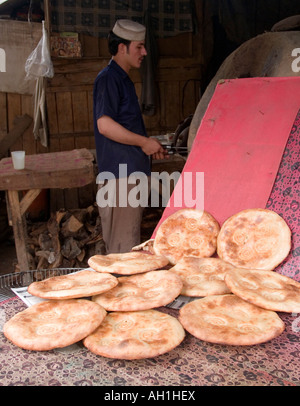 fresh nan in bakery in Afghan Smuggler s Bazaar Peshawar Pakistan Stock Photo