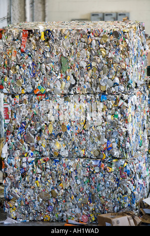 Aluminium recycling. Blocks of compacted aluminum waste stored on ...