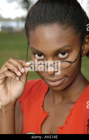 Close Up of a Black Female Teen with Glasses Stock Photo