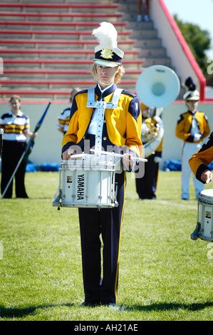 High School marching Band Plays Music At Football Game Stock Photo