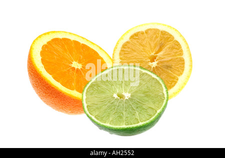 Halves of an orange, a lime, and a lemon silhouetted on white background Stock Photo