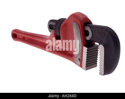 close up of red grey black pipe wrench silhouetted on white background Stock Photo