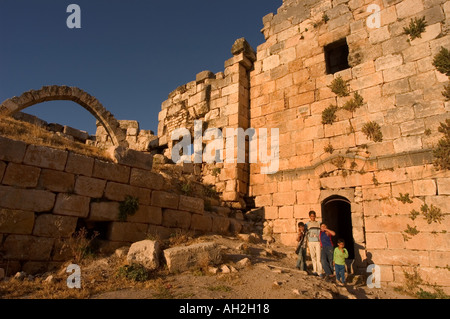 children of Qala at al Mudiq medieval castle Apamea Qalat at al Mudiq Syria Middle East Stock Photo