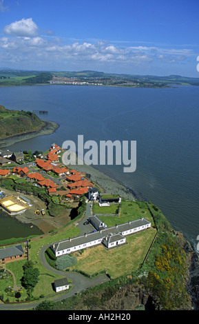 View across the Coast Guard Station in North Queensferry to Dalgety Bay from the Forth Rail Bridge Stock Photo