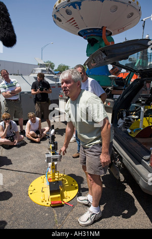 Dr Josh Wurman of The Center For Severe Weather Research (CSWR) talks about a tornado probe to a group of storm chasers. Kansas, USA Stock Photo