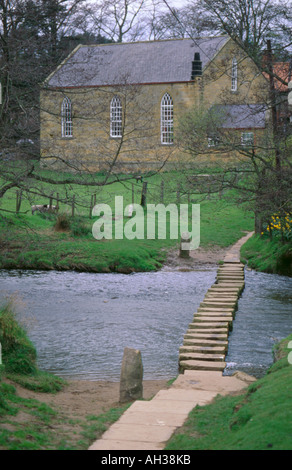 Stepping stones over the River Esk at Lealholm, Esk Dale, North York Moors National Park, North Yorkshire, England, UK. Stock Photo