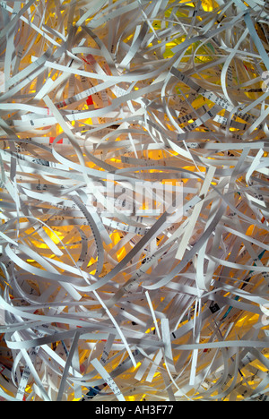Shredded paper yellow background Stock Photo