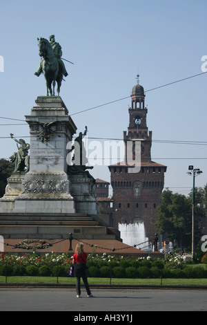 Statue of Giuseppe Garibaldi in Largo Cairoli with Filarete Tower of Castello Sforzesco Milan Italy September 2007 Stock Photo