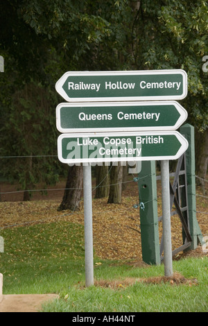 First world war memrial signpost to the Railway Hollow, Queens and Luke Copse British war cemeteries on the Somme, France Stock Photo