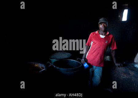 Cook and staff member in kitchen at Home of Hope Orphanage, Malawi, from where Madonna adopted David Banda Stock Photo