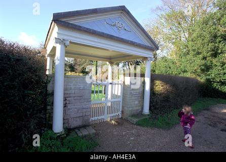 A child at the entrance to the graveyard of Col T E Lawrence Lawrence of Arabia Stock Photo