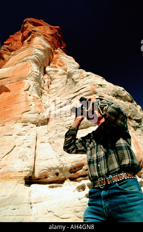 adventurer with binoculars, Cater's Pillar, Northern Territory, Australia Stock Photo