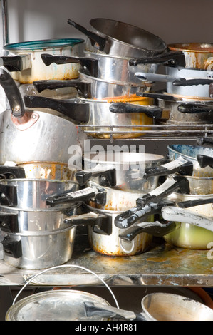 Pots and Pans in a messy stack Stock Photo