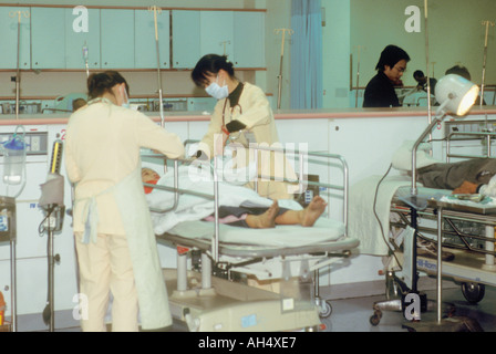 Nurses Caring For Child Patient In Hospital Emergency Room ER Republic of China Taiwan Stock Photo