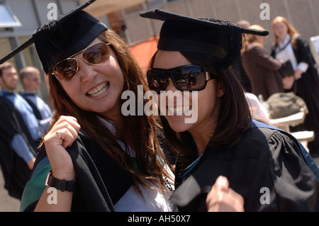 two Female graduates, Graduation day, aberystwyth university of wales, summer afternoon Stock Photo