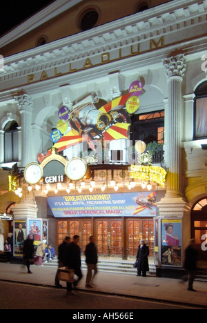 London Palladium Theatre night exterior front floodlit facade sign & car for Chitty Chitty Bang Bang musical in West End London theatreland England UK Stock Photo