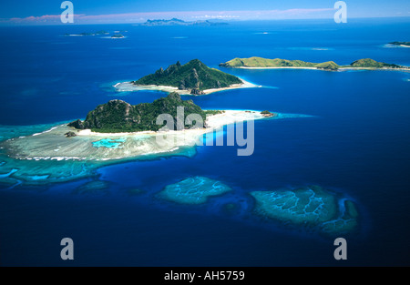 Monuriki Monu and Yanuya Islands Mamanuca Islands front left to distant right Fiji aerial Stock Photo