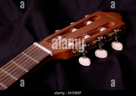 Spanish guitar headstock classical on a black background Stock Photo ...