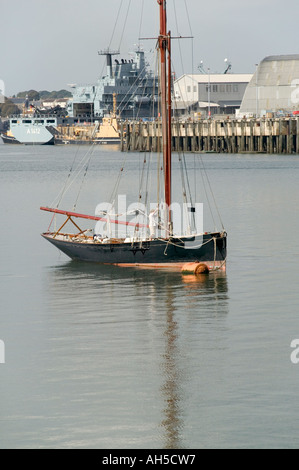 The old and the modern on the Hamoaze section of the Tamar Plymouth Devon Great Britain Stock Photo