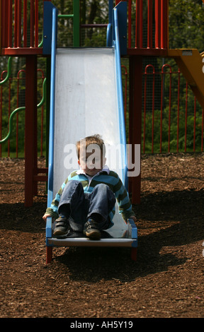 Lewis aged four at Woodthorpe Grange Park Children s Play area Stock Photo