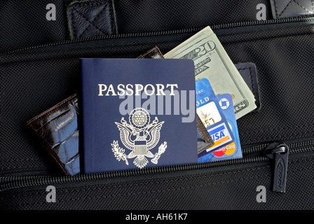 'United States of America ^Passport, 'credit cards' and 'dollar bills' in 'briefcase pocket'. Stock Photo