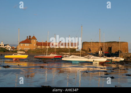 Moored yachts in Beadnell Harbour in Northumberland Stock Photo