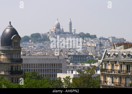 View towards Sacre Coeur from the Belvedere (or Temple) of Sybil, Parc des Buttes Chaumont Paris France Stock Photo