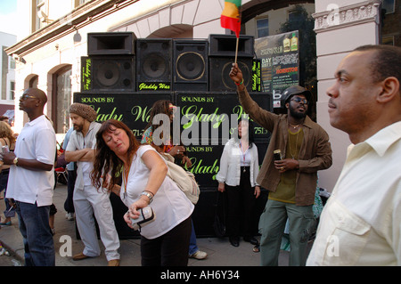 multi-cultural group dancing and socialising at Notting Hill annual Carnival. Stock Photo