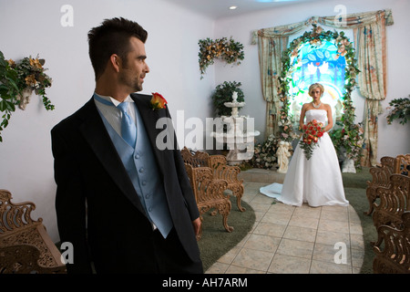 Groom leaving a bride at the altar Stock Photo