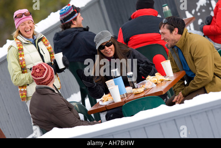 Group of people sitting at a table Stock Photo