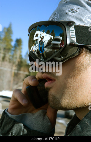 Close-up of a young man talking on a mobile phone Stock Photo