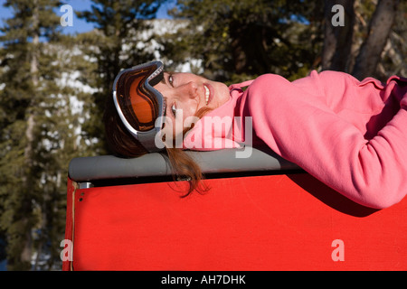 Young woman lying down and smiling Stock Photo