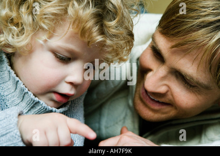 Close-up of a boy and his father Stock Photo