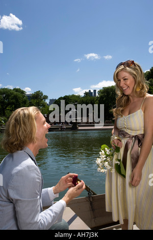 Young couple looking at each other and smiling, Central Park, Manhattan, New York City, New York, USA Stock Photo