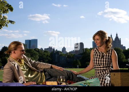 Young couple in a park, Central Park, Manhattan, New York City, New York, USA Stock Photo