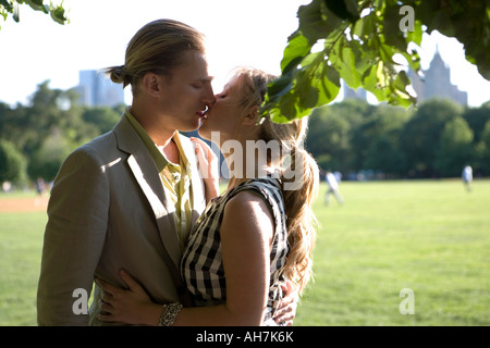 Young couple kissing each other Stock Photo