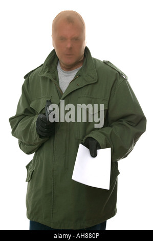 Armed robber holding out a blank demand enter your own text Isolated on white Stock Photo