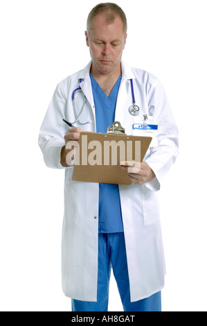 Doctor writing in a patients notes Stock Photo