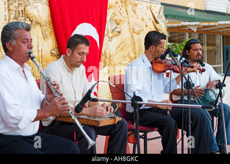 Turkish musicians perform using traditional instruments at hotel Stock Photo