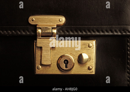 Briefcase with closed lock - detail Stock Photo