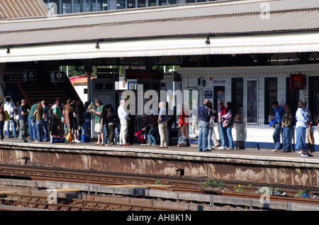 People on platform at Clapham Junction railway station, London, England, UK Stock Photo