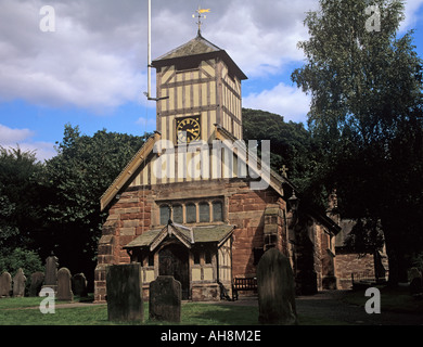 WHITMORE STAFFORDSHIRE England UK August 12thc Church of St Mary and All Saints with unusual timber framed clock tower Stock Photo