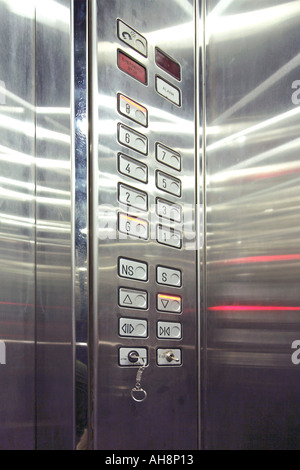Elevator lift steel interior floor indicators up down ground first second third fourth fifth sixth seventh eighth Stock Photo