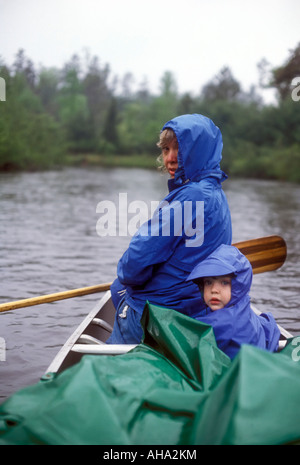 Mom and daughter on canoe trip Stock Photo